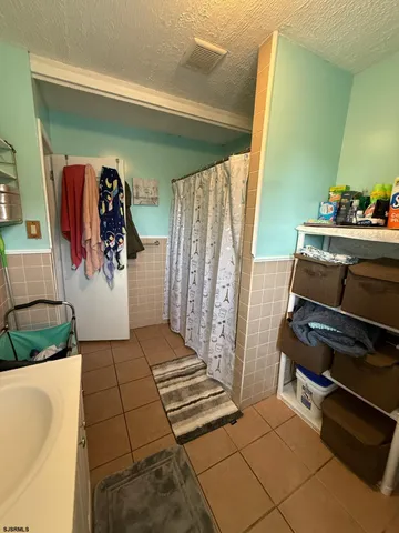 a living room with a couch and a table