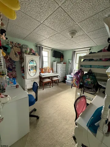 a room with lots of furniture and a equipment