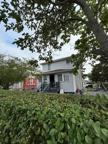 a house view with a garden space