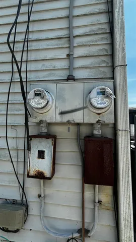 a view of light fixtures and wooden floor