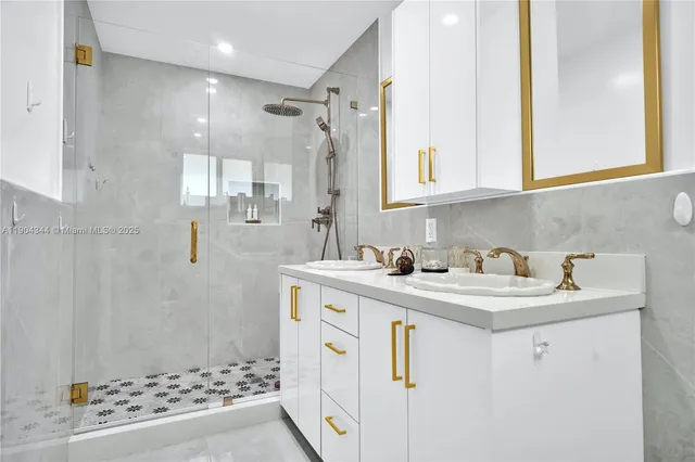 a view of bathroom with dual sinks