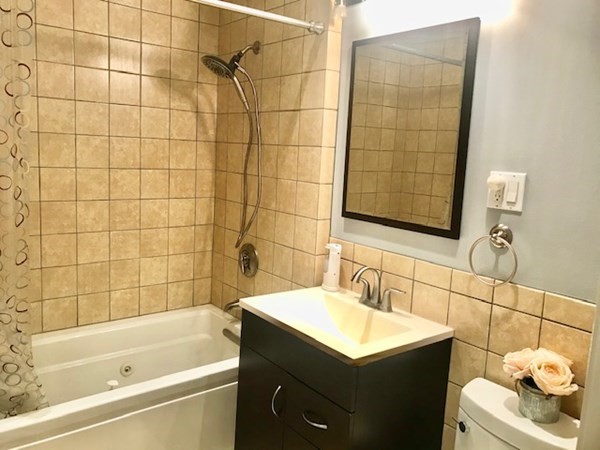 11 Vanness Road Weymouth, MA 02191 - Photo 14 of 25 a bathroom with a sink toilet and shower