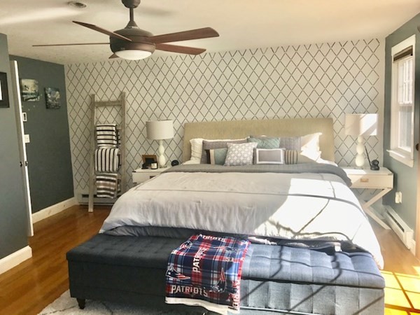11 Vanness Road Weymouth, MA 02191 - Photo 17 of 25 a bedroom with a bed and a mirror