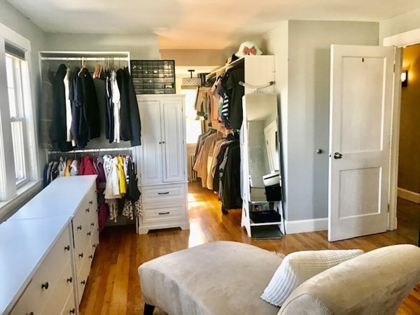 11 Vanness Road Weymouth, MA 02191 - Photo 20 of 25 a bedroom with a bed and a walk in closet