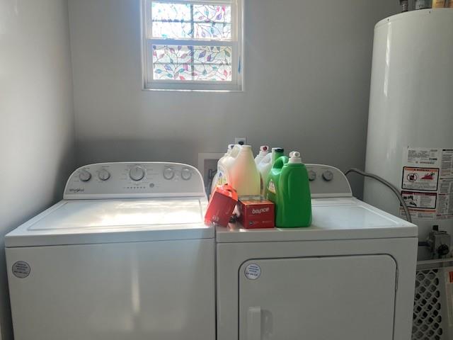 4207 Aztec Drive Dallas, TX 75216 - Photo 15 of 28 a utility room with dryer and washer