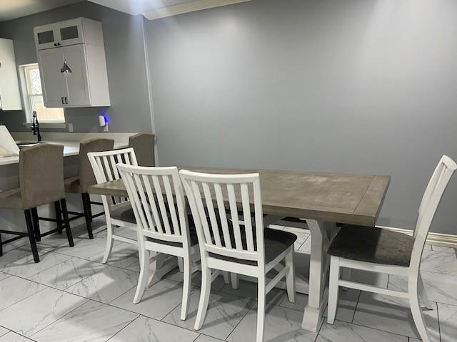 4207 Aztec Drive Dallas, TX 75216 - Photo 21 of 28 a view of a dining room with furniture