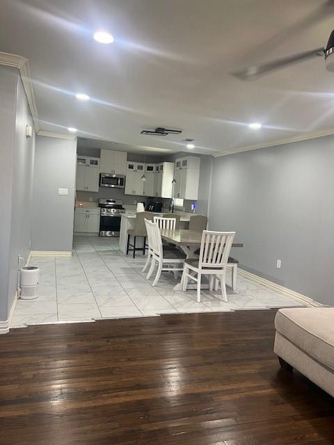 4207 Aztec Drive Dallas, TX 75216 - Photo 6 of 28 a view of a dining room with furniture and wooden floor