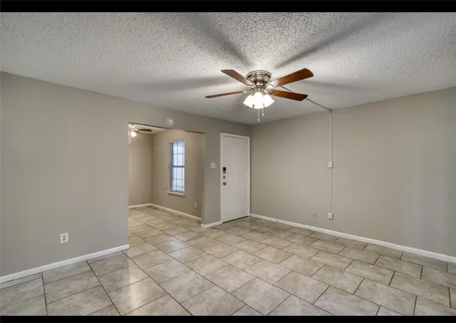 a kitchen with stainless steel appliances a refrigerator and a microwave