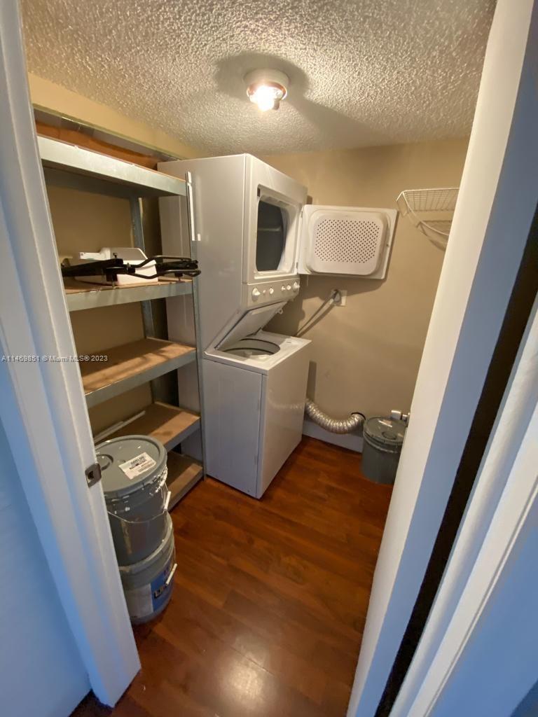 8830 Southwest 123rd Court, Unit I407 Miami, FL 33186 - Photo 13 of 18 a view of living room with furniture and flat screen tv
