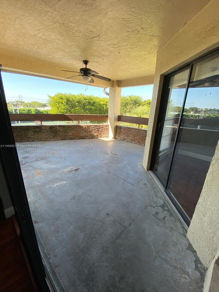 8830 Southwest 123rd Court, Unit I407 Miami, FL 33186 - Photo 8 of 18 a view of a floor to ceiling window and an ocean view