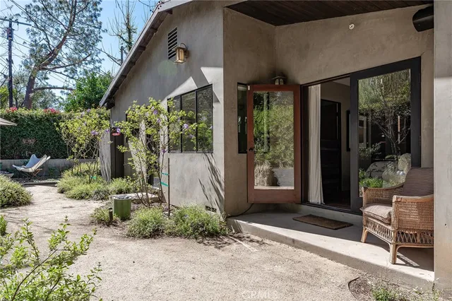 a bathroom with a bathtub sink and mirror