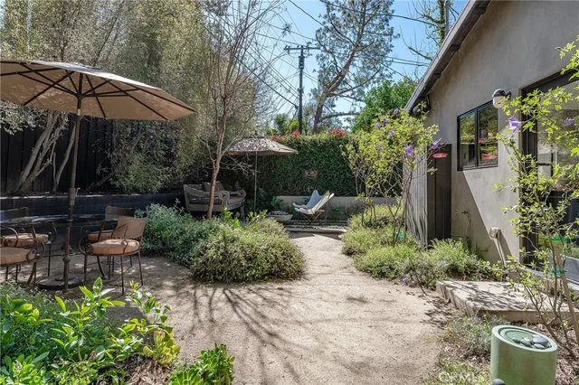 a house view with a garden space