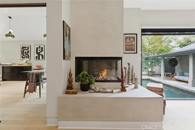 a view of living room with furniture and floor to ceiling window