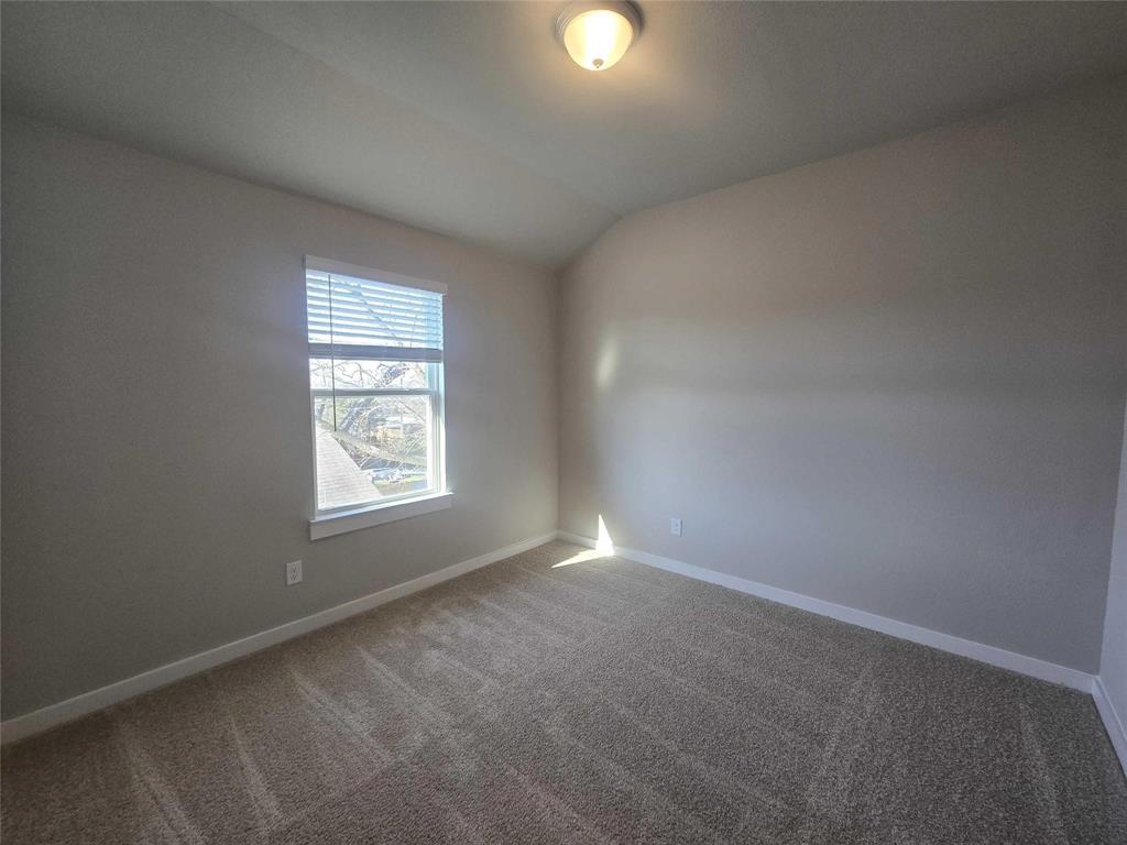 331 East Hull Street Denison, TX 75021 - Photo 15 of 17 an empty room with a window