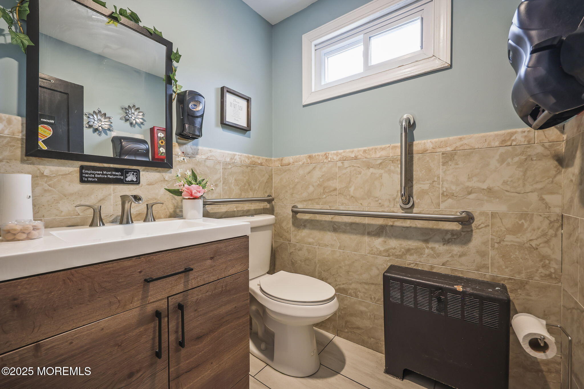Herbertsville Road Brick, NJ 08724 - Photo 13 of 35 a bathroom with a toilet sink and mirror