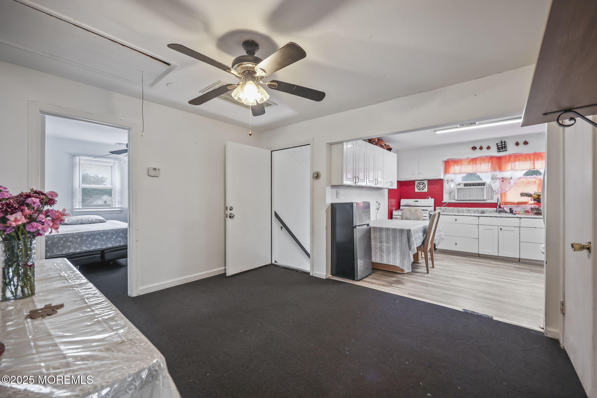 Herbertsville Road Brick, NJ 08724 - Photo 20 of 35 a storage room with furniture and a chandelier