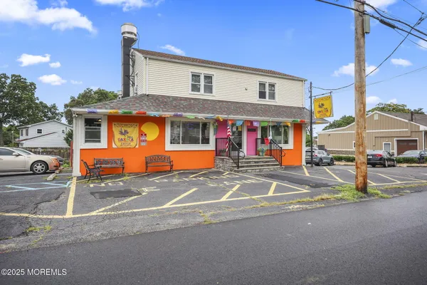 a front view of a building with street view