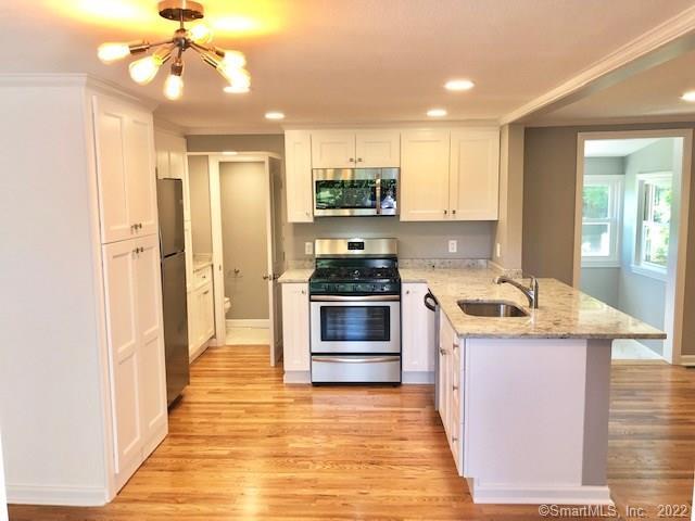 a kitchen with a stove and a kitchen