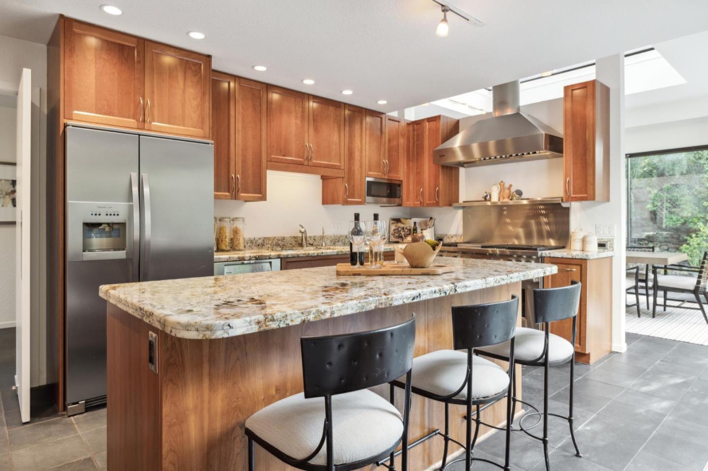 1732 Middlefield Road Palo Alto, CA 94301 - Photo 15 of 42 a kitchen with stainless steel appliances granite countertop a sink refrigerator and cabinets