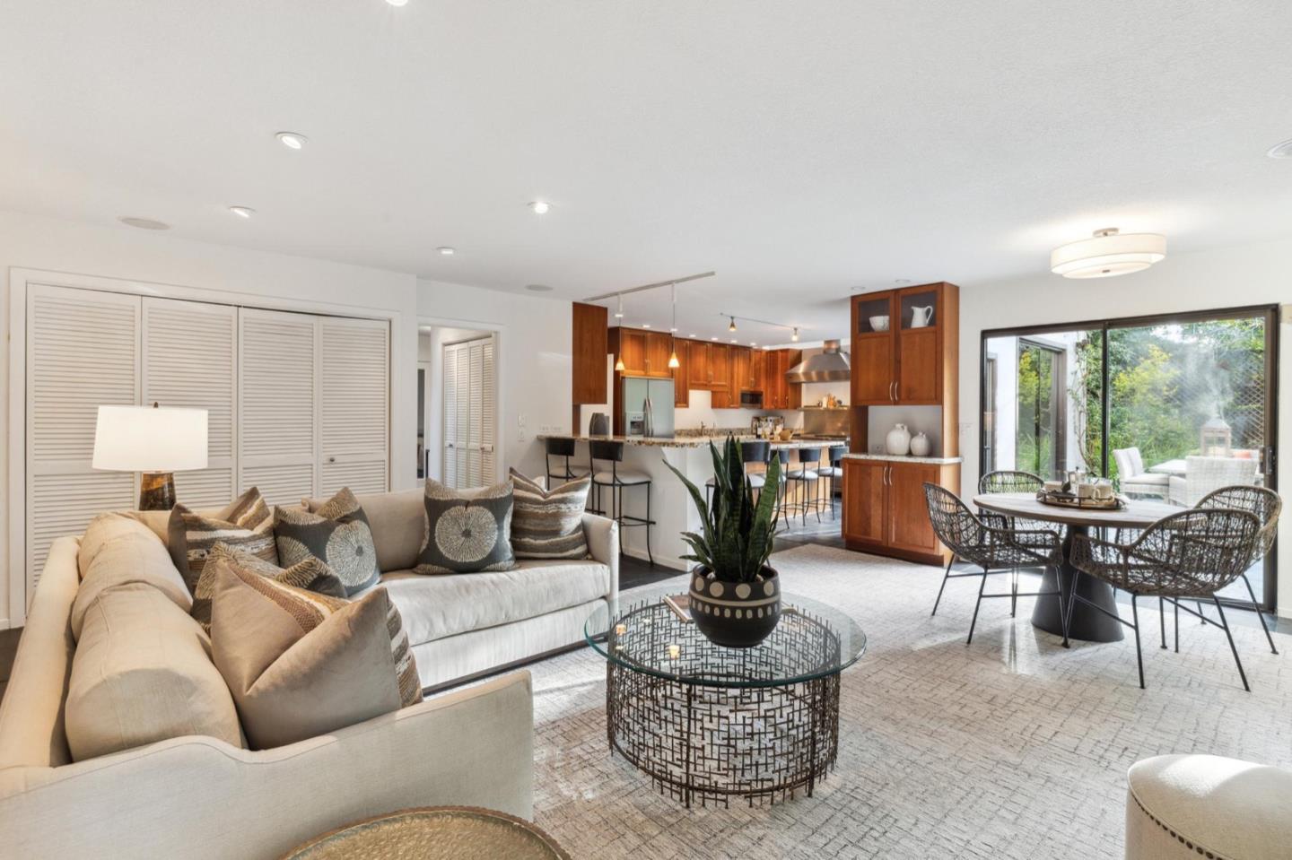 1732 Middlefield Road Palo Alto, CA 94301 - Photo 17 of 42 a living room with furniture a lamp and a large window