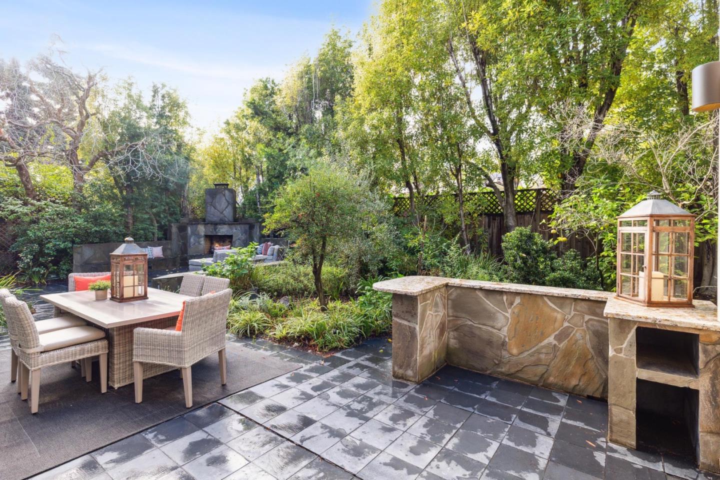 1732 Middlefield Road Palo Alto, CA 94301 - Photo 18 of 42 a view of a patio with table and chairs and potted plants