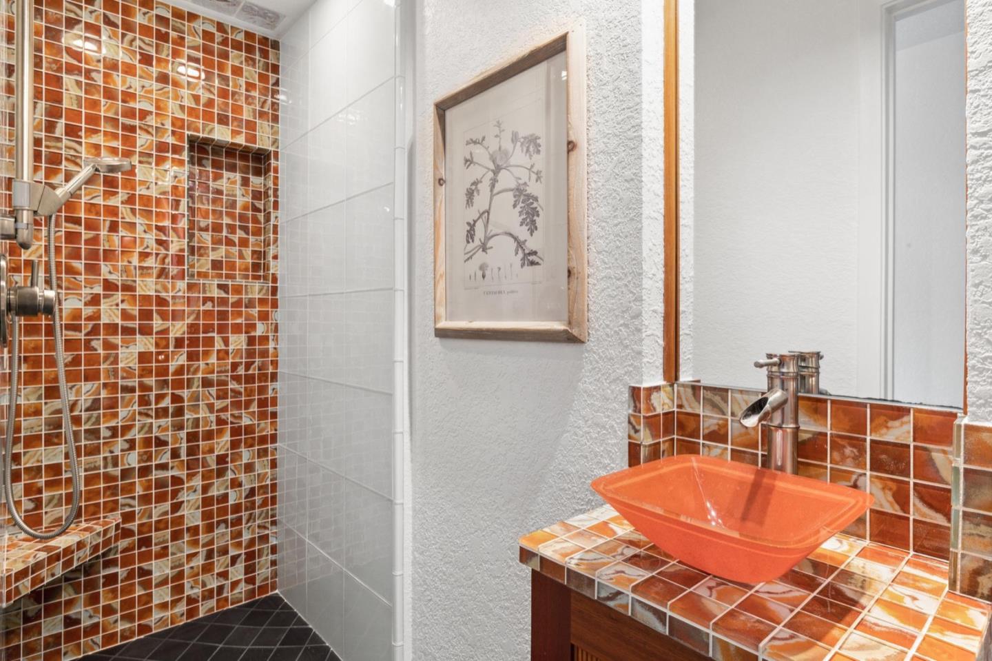 1732 Middlefield Road Palo Alto, CA 94301 - Photo 27 of 42 a bathroom with a sink and a mirror