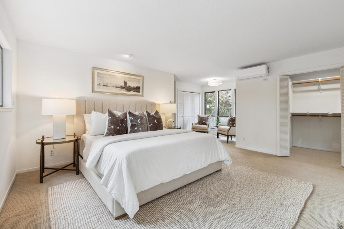 1732 Middlefield Road Palo Alto, CA 94301 - Photo 31 of 42 a large bed sitting in a bedroom and table