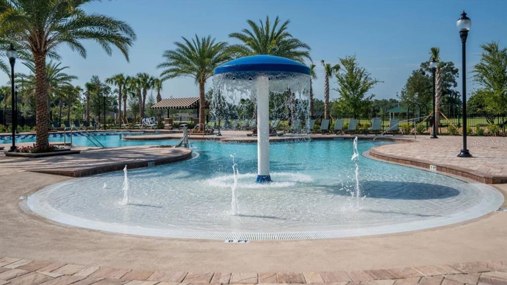 2525 Southwest 121st Way Gainesville, FL 32608 - Photo 2 of 6 a view of a backyard with palm trees