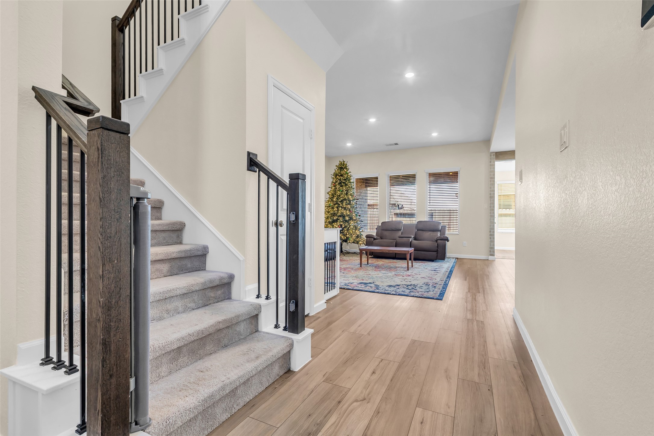 9502 Marble Park Lane Baytown, TX 77521 - Photo 11 of 40 a view of entryway and livingroom with wooden floor