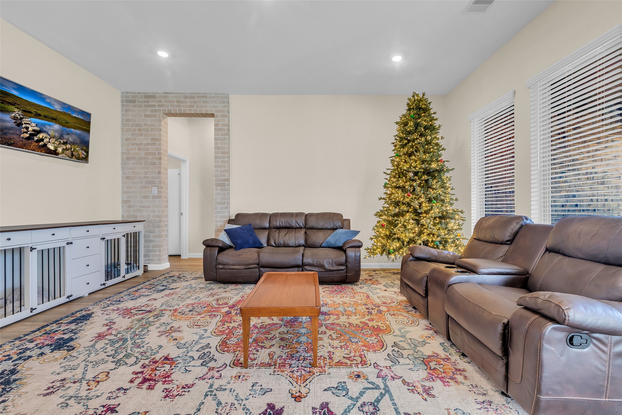 9502 Marble Park Lane Baytown, TX 77521 - Photo 15 of 40 a living room with furniture and a potted plant