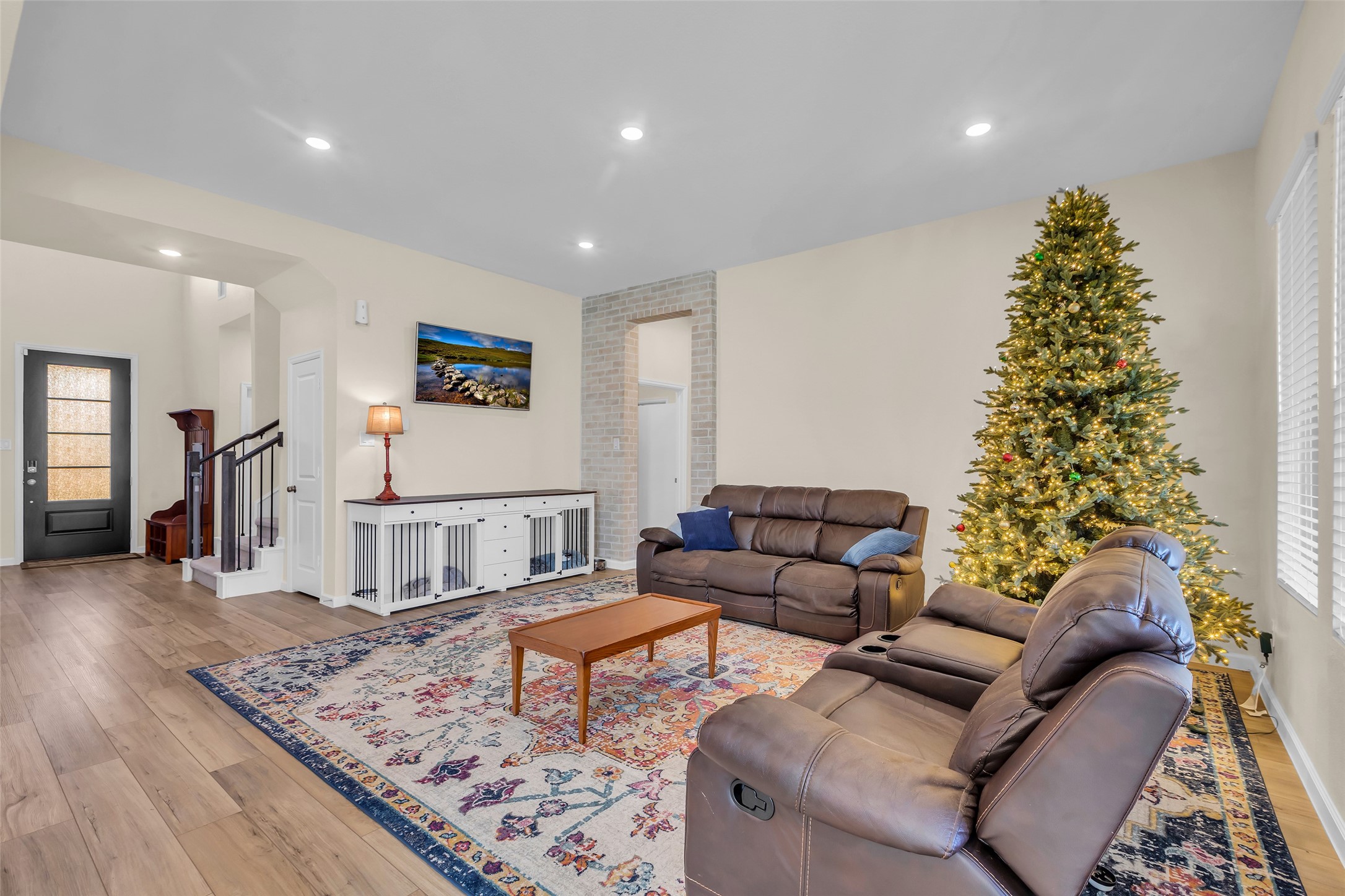 9502 Marble Park Lane Baytown, TX 77521 - Photo 16 of 40 a living room with furniture and a wooden floor