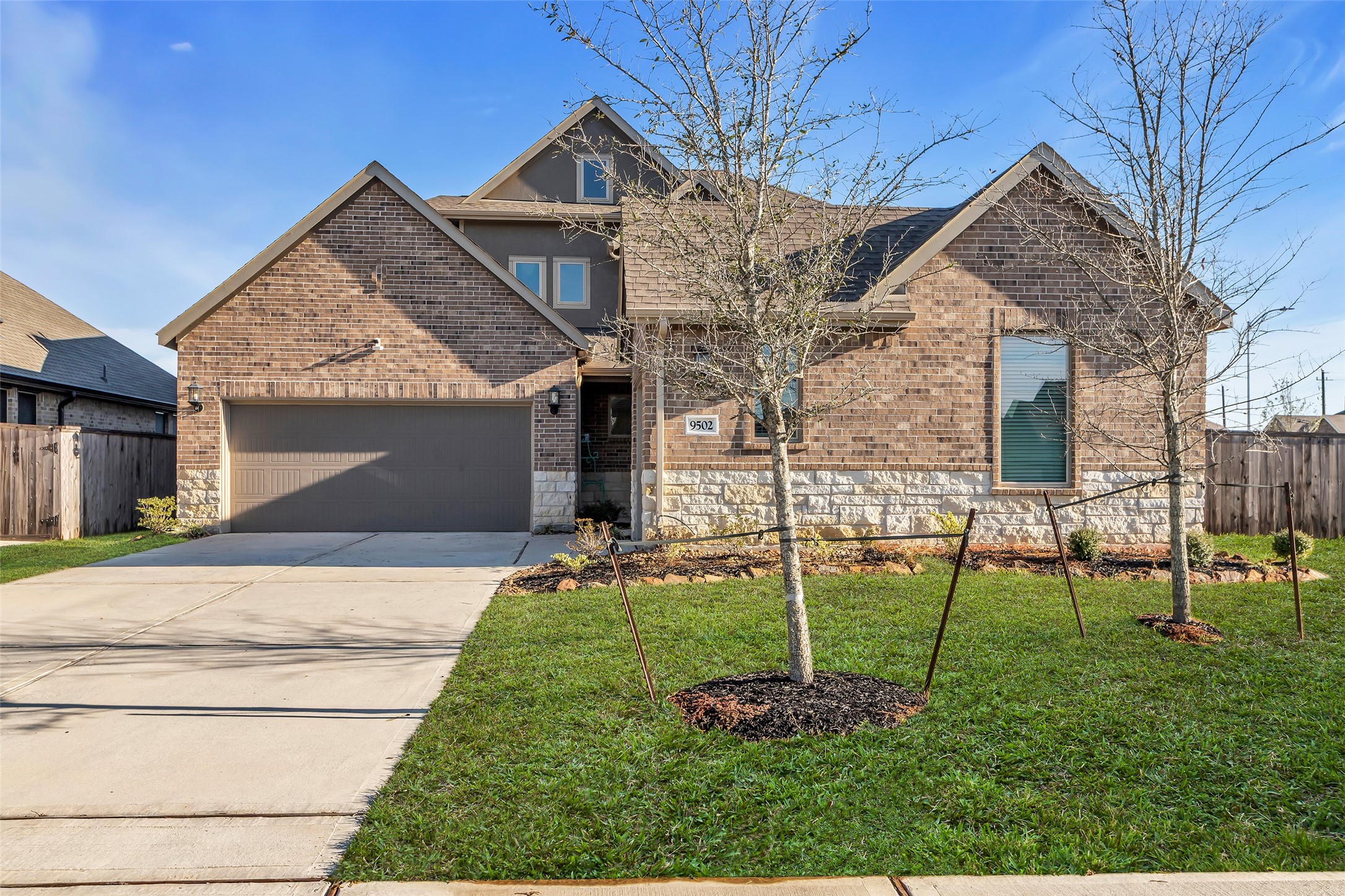 9502 Marble Park Lane Baytown, TX 77521 - Photo 2 of 40 a front view of a house with a garden