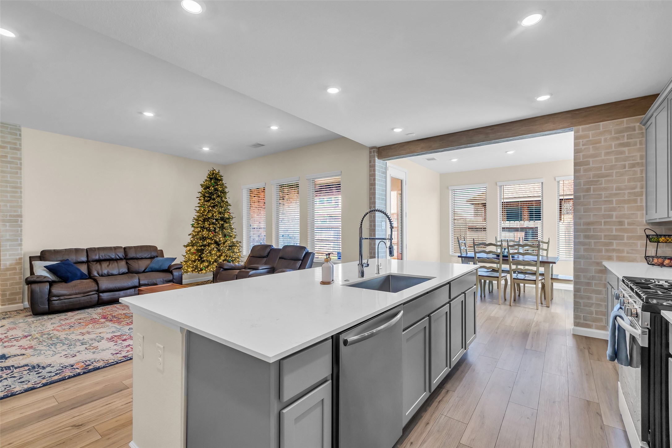 9502 Marble Park Lane Baytown, TX 77521 - Photo 23 of 40 a living room with furniture a flat screen tv and a table