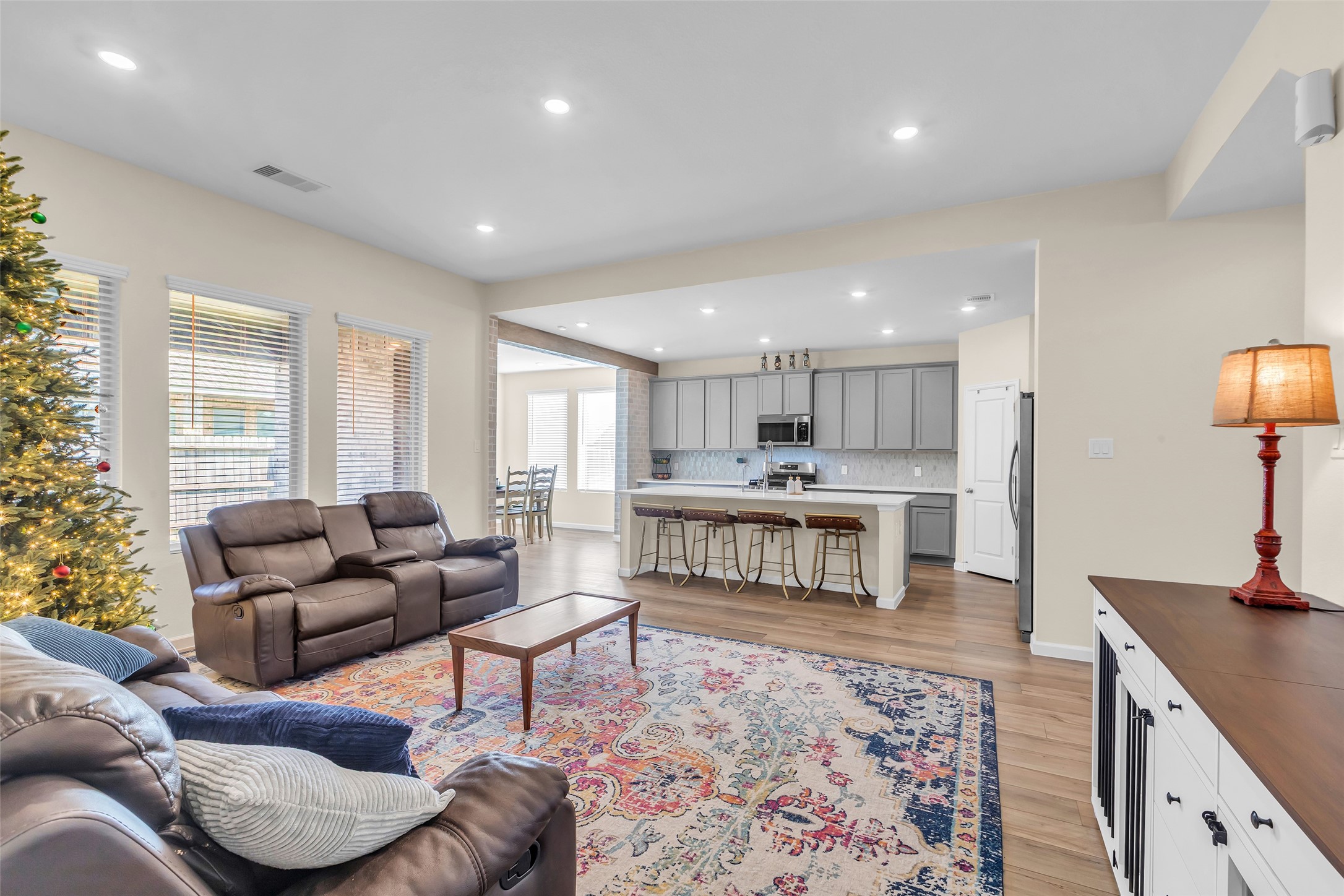 9502 Marble Park Lane Baytown, TX 77521 - Photo 25 of 40 a living room with furniture and a wooden floor