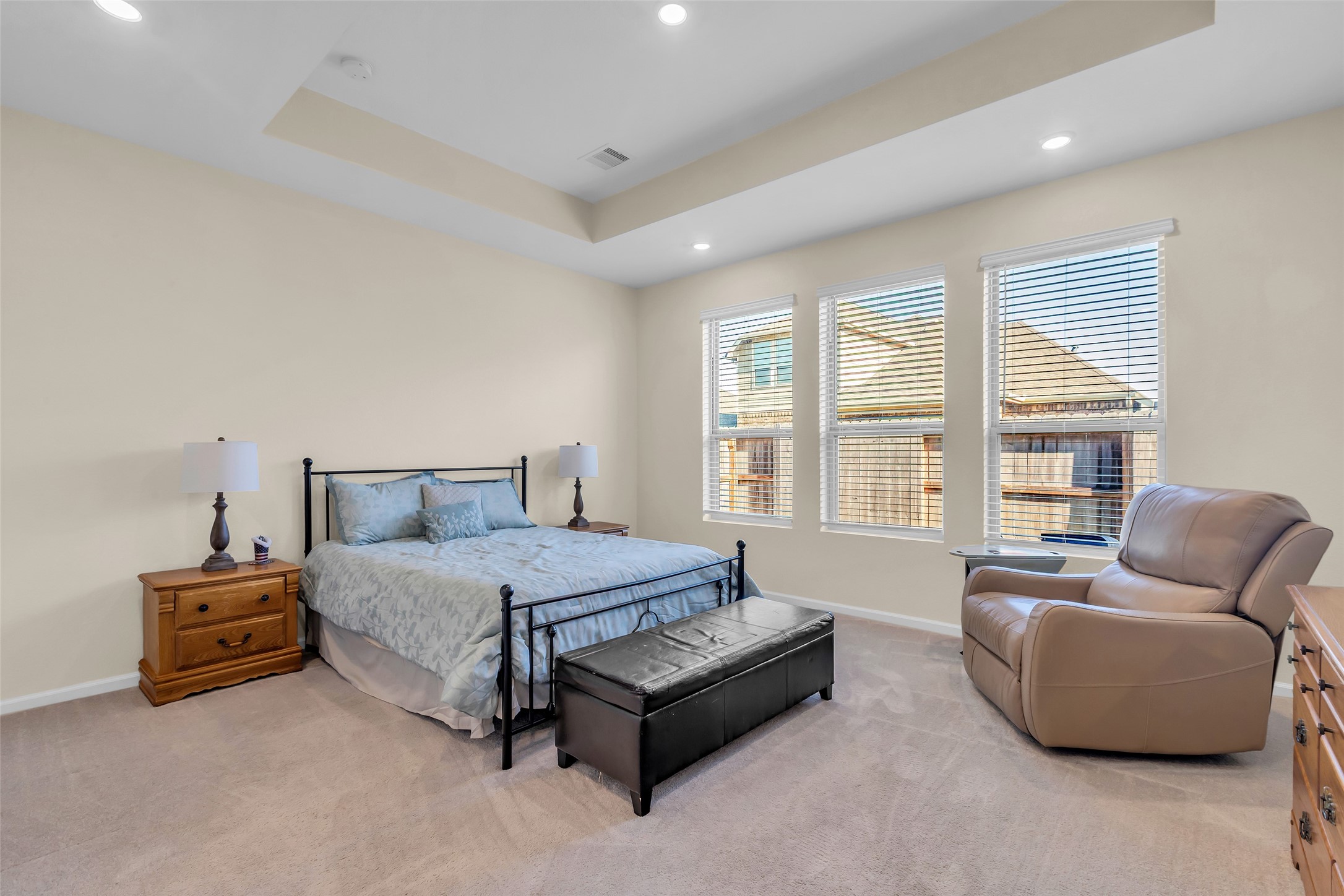 9502 Marble Park Lane Baytown, TX 77521 - Photo 26 of 40 a spacious bedroom with a bed and glass window