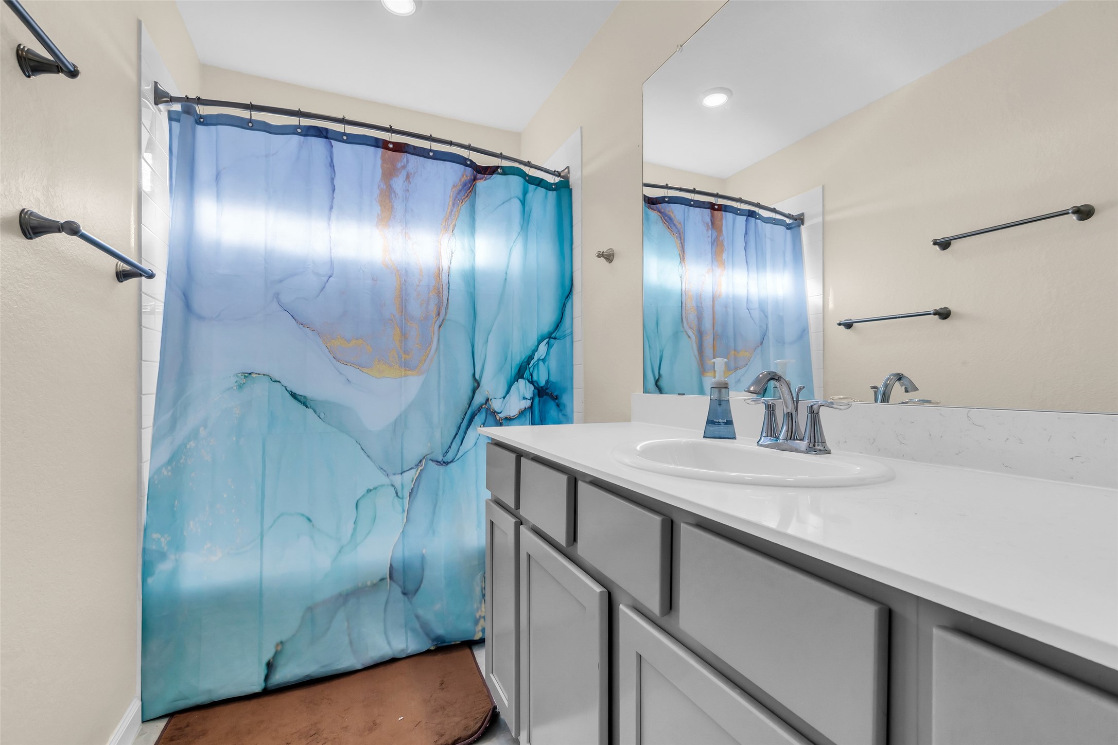 9502 Marble Park Lane Baytown, TX 77521 - Photo 31 of 40 a bathroom with a sink and mirror