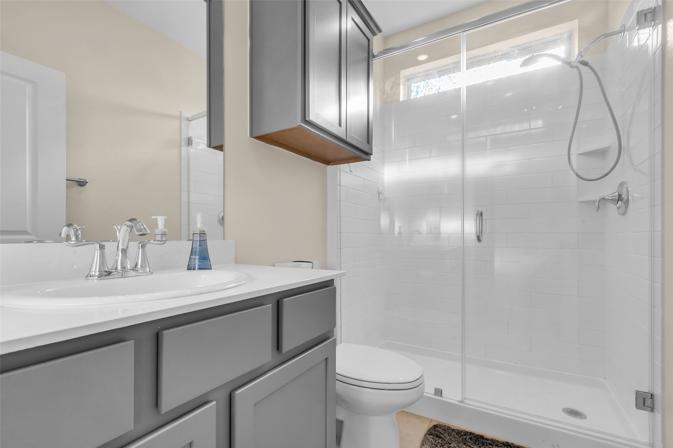 9502 Marble Park Lane Baytown, TX 77521 - Photo 9 of 40 a bathroom with a granite countertop sink a toilet and shower