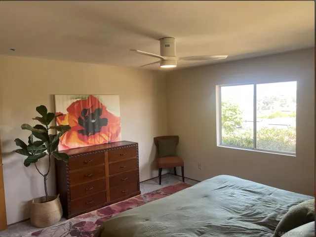 a view of a livingroom with furniture