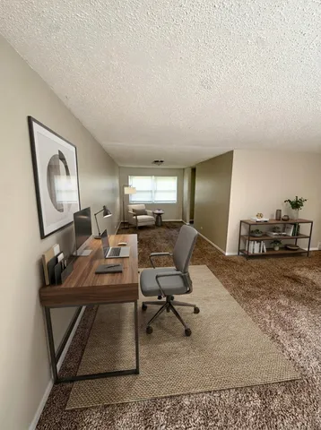 a workspace with furniture