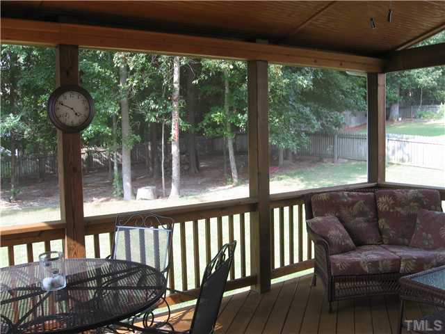 1515 Patterson Grove Road Apex, NC 27502 - Photo 17 of 25 You'll want to spend your mornings and evenings on this fabulous screened porch.