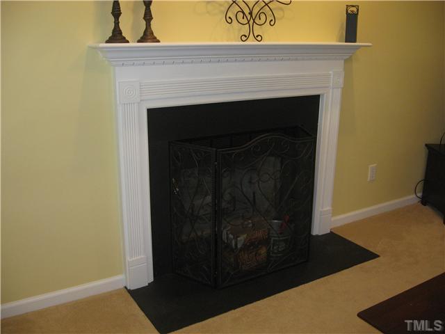 1515 Patterson Grove Road Apex, NC 27502 - Photo 8 of 25 Wood burning fireplace is plumbed for natural gas.