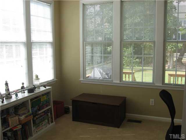 1515 Patterson Grove Road Apex, NC 27502 - Photo 10 of 25 The sunroom makes a great home office or play room.