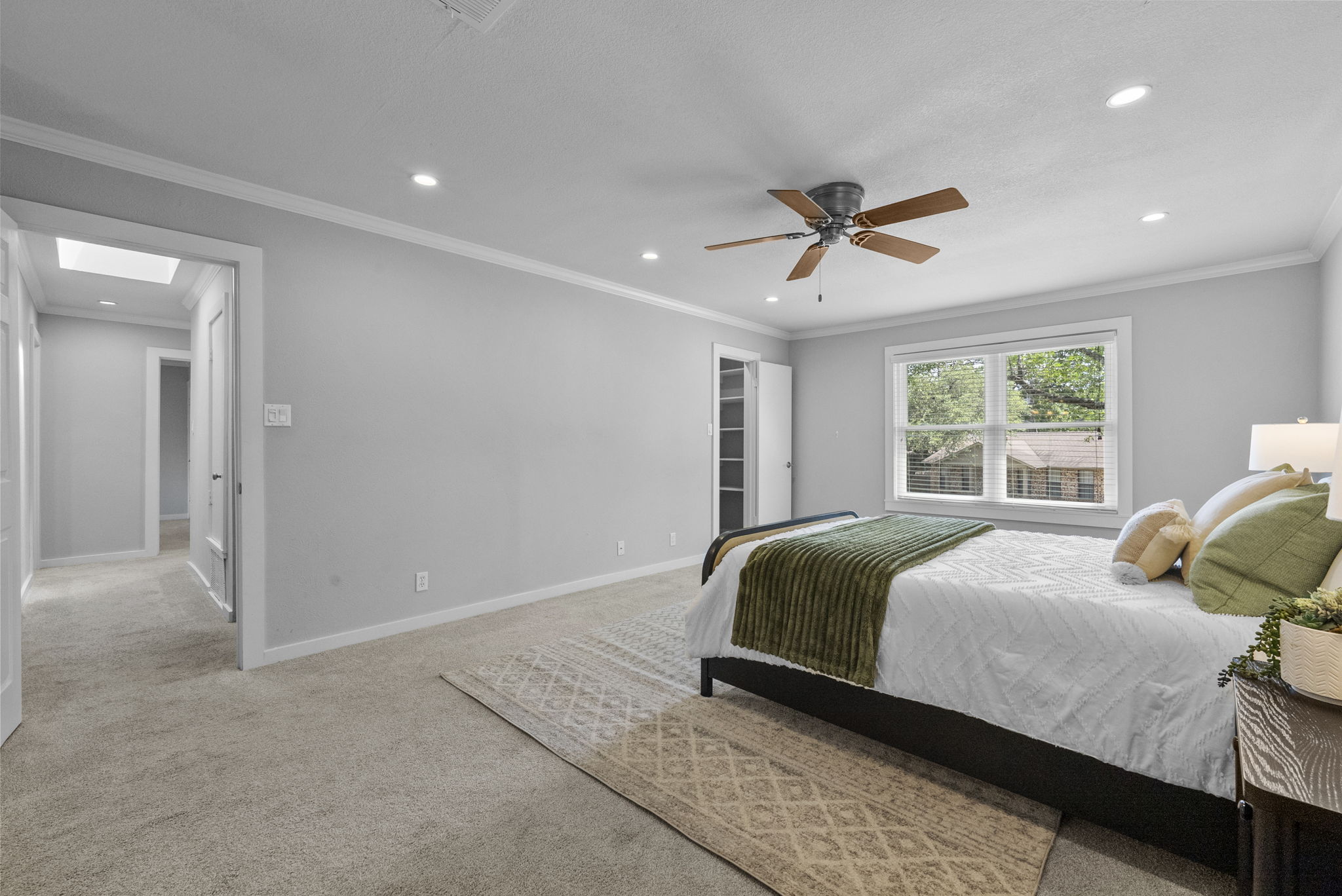 11405 Pyreneese Drive Austin, TX 78759 - Photo 18 of 37 a bedroom with a bed and window