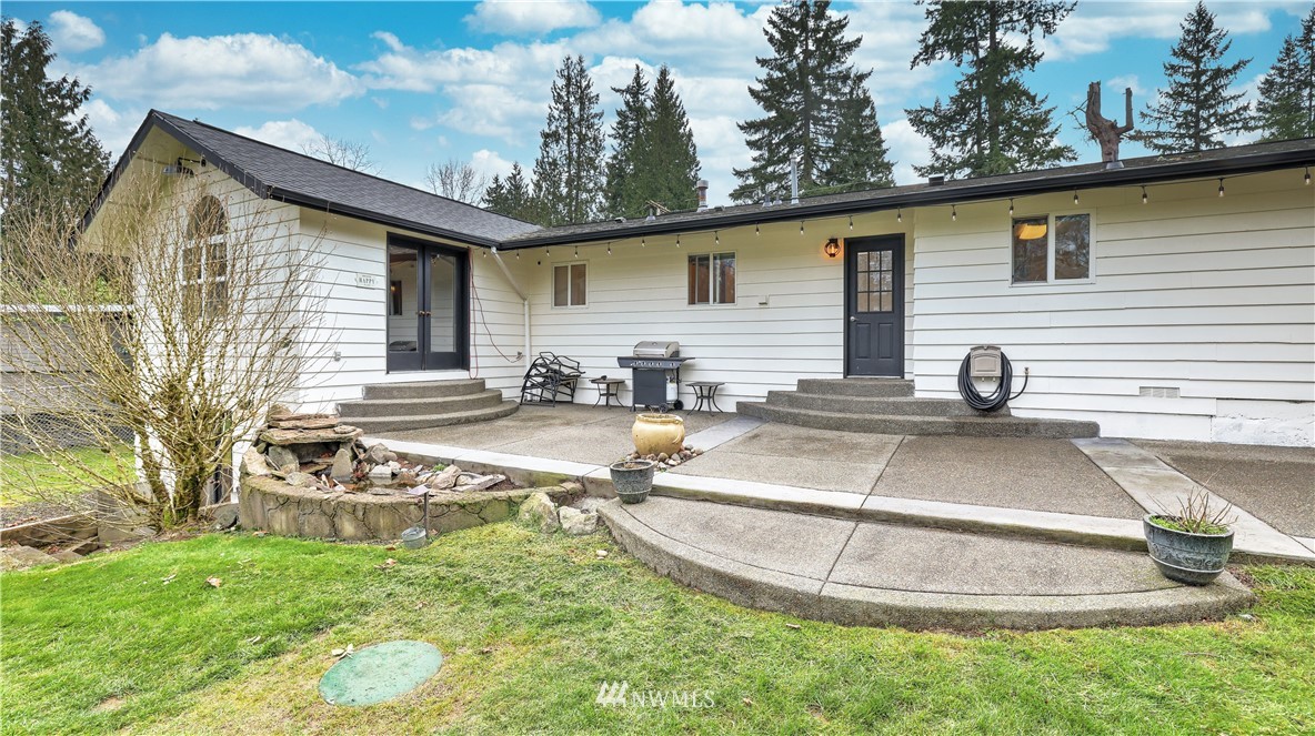 18236 Southeast 135th Street Renton, WA 98059 - Photo 23 of 31 a view of a house with pool