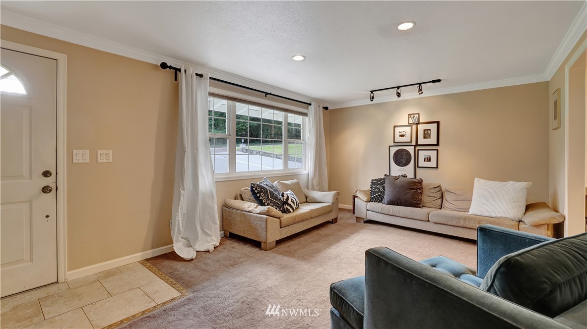 18236 Southeast 135th Street Renton, WA 98059 - Photo 5 of 31 a living room with furniture and a window