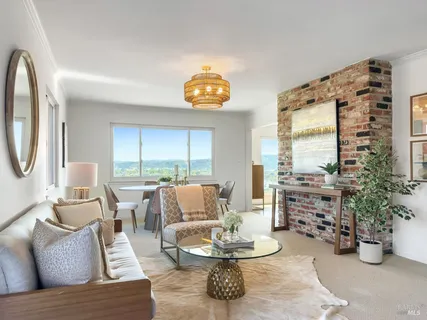 a view of a balcony with chairs