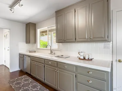 a bedroom with bed and a window