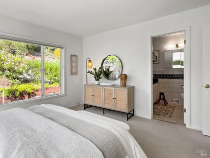 a bathroom with a shower and a bathtub