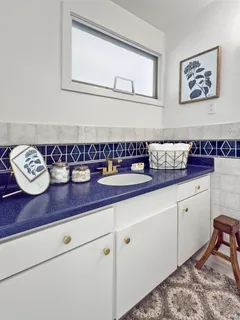 a kitchen with stainless steel appliances a refrigerator sink and cabinets