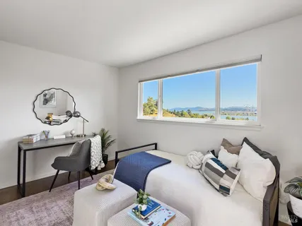 a view of backyard of house with seating space